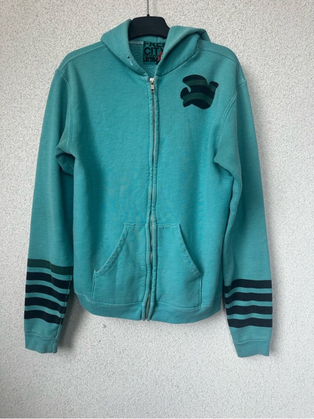Free City "Forever Leisure"
Zip Up  Size 2 Stripe
Sleeve Dove Logo *as is*